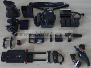 Canon C300 EF shoulder mount kit NOTE: following items missing from image: - 2 x 16GB SanDisk memory cards - Porta Brace raincover - AudioTechnica ATR875 microphone - Rode windshield